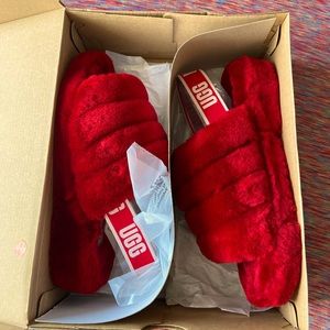 UGG Yeah Fluff Slide. They’re red and a size 9 in Women.